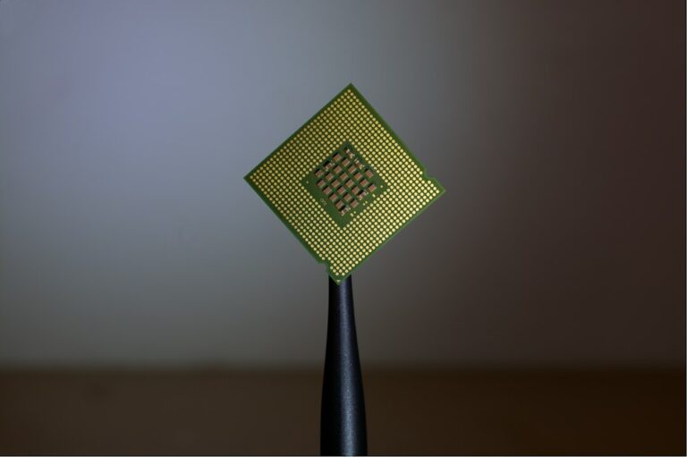 Close-up of a computer chip, representing commercial off-the-shelf electronic components used in manufacturing