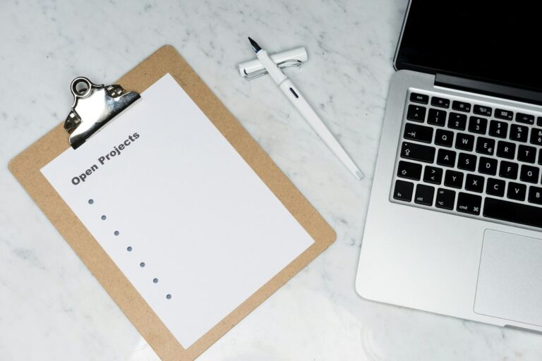 Checklist on paper with a pen, representing planning the transition to ISO 9001:2026